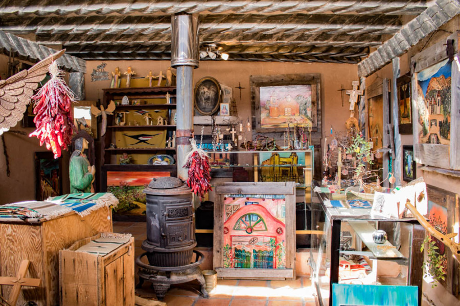 A local gallery and antique store in the Plaza del Cerro (plaza by the hill) above the historic El Santuario de Chimayó in Chimayo, NM. Photo by Chris Dorantes 