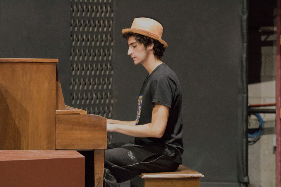 Sophomore Performing Arts major Niko’a Salas plays the piano in Shakespeare’s Twelfth Night. Photo by Chris Dorantes