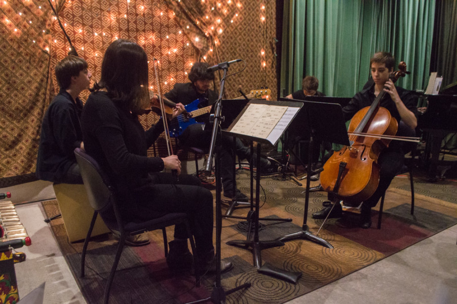 Five students and one professor performed the first piece of the night “Springtime Piecemeal” with percussion, a violin, an electric bass, an electric guitar, a cello, and a piano. Photo by Jennifer Rapinchuk.