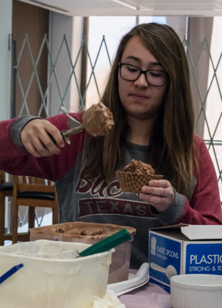 Sophomore Film major Maya Ilarraza likes chocolate ice cream in her sundae. Photo by Sasha Hill