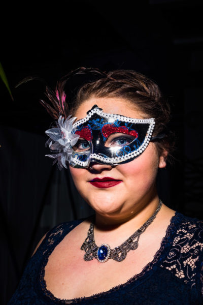 Aubrey Hicks is all dressed up for the Masquerade Ball. Photo by Sasha Hill
