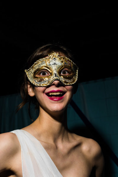 Victoria Bell, a junior Theater major, enjoys herself at the Masquerade Ball. Photo by Sasha Hill