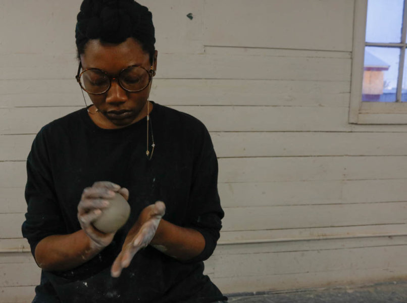Studio Arts sophomore Elisis Miller shapes clay for an upcoming studio arts final. Photo by Jesus Trujillo