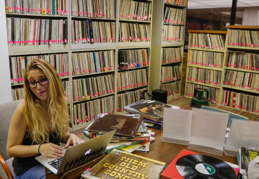 Creative Writing major Rose Hutson, explores the  Fogelson Music Library as she works. Photo by Jesus Trujillo