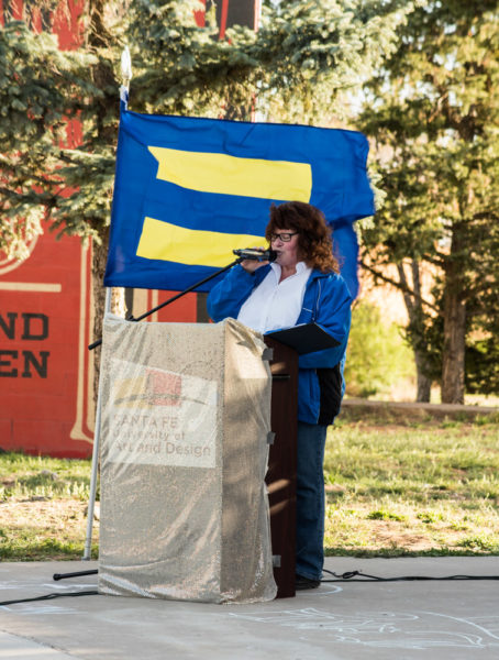 Linda Krauss giving her speech about the foundation and evolution of the PRIDE flag. Photo by Sasha Hill