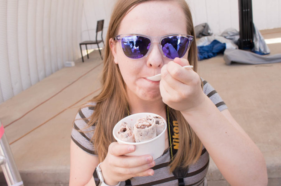 Katie Stawick eats her chocolate ice cream after standing in line for two hours. Photo by Lexi Malone