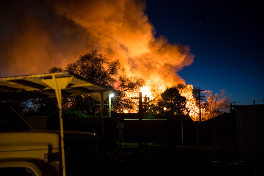 Old army barracks bursts catch fire as the fire could be seen from the distance. Photo by Jason Stilgebouer