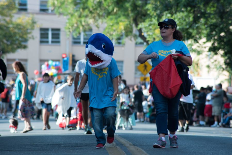 Shark Boy tossing out candy. Photo by Sasha Hill