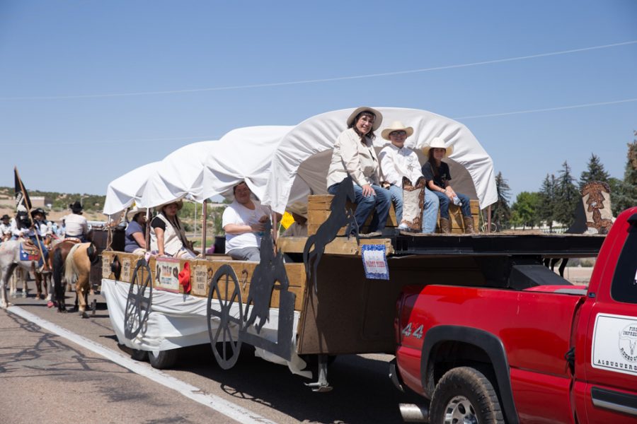 The Albuquerque Rodeo brings up the rear end during the Historical Hysterical Parade during fiestas. Photo by Jason Stilgebouer
