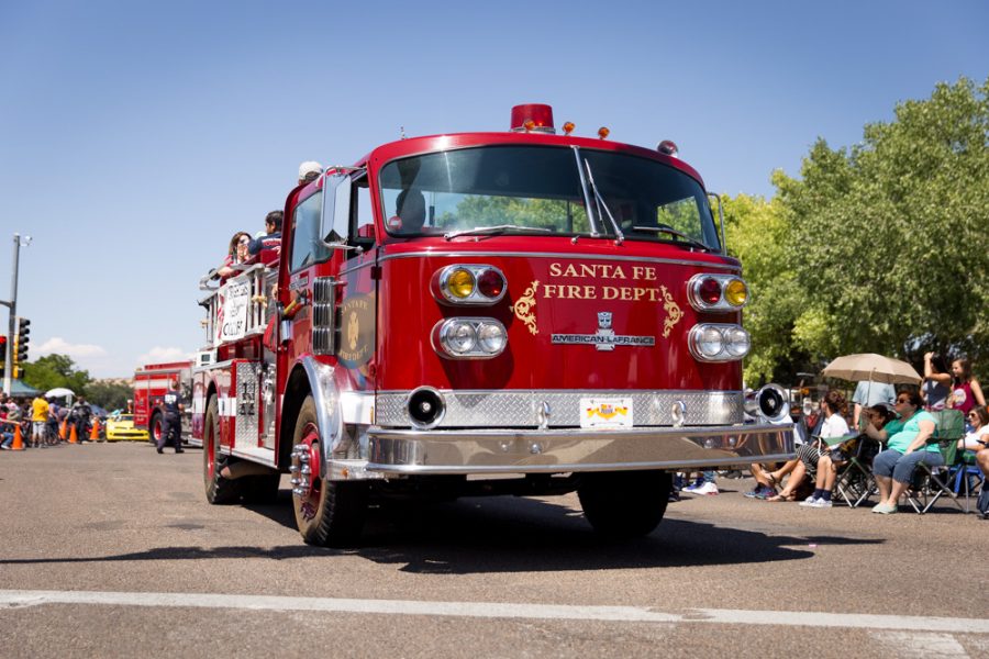 The Santa Fe Fire Department leads the Historical Hysterical parade during Fiestas. Photo by Jason Stilgebouer