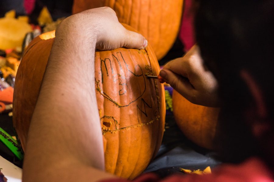 Carving out a freehand design. Photo by Sasha Hill