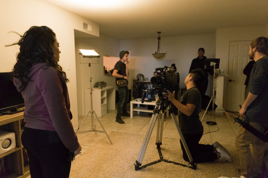 Santa Fe University of Art and Design students gather together in a final effort to create a suspenseful thriller film called “Hear Me Out.” Photo by Jason Stilgebouer
